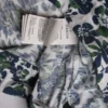 imagen que describe camiseta tipo polo nautica de la tienda online american store